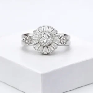 Make a statement with this premium ring. Adorned with a brilliant sunburst cluster of baguette and round crystals, it radiates luxury and everyday glamour.